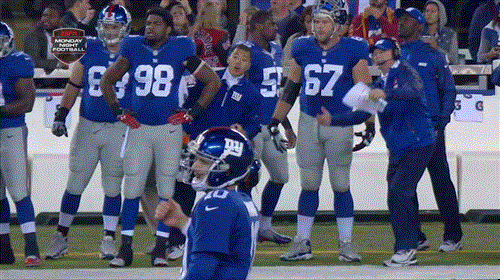 Eli Manning and Tom Coughlin react to TE Larry Donnell falling down.