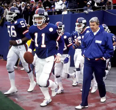 Lawrence Taylor, Phil Simms, and Bill Parcells; New York Giants (November 23, 1986)