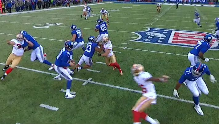 Pocket collapsing on Manning as he rushes his throw
