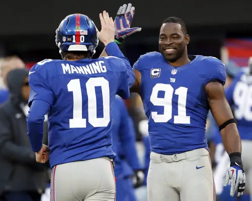 Eli Manning (10), Justin Tuck (91), New York Giants (December 30, 2012)